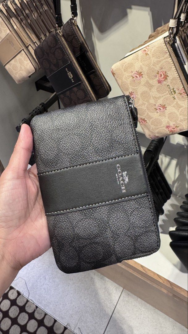 Coach Wristlet Pasabuy from Coach Canada (Category: Wallets & Card holders) located in Anao. Submitted by declutterwithme0520 (Listing ID 1463719794, Image 2). Description: Pasabuy from Coach Canada🇨🇦 ETA Last week of October 2026 50% DP balance upon arrival before shipping Small size 3,200 Large 3,800 - Classic Signature C print available in: - Tan with brown stripe - Black with grey stripe - Beige with floral print - Also available in plain b
