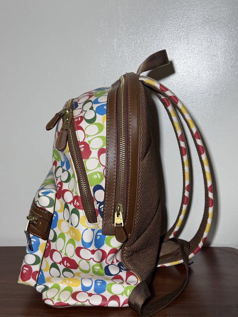 Coach x Bape Multi-Color Monogram Backpack (Category: Backpacks) located in Manila. Submitted by dreyaa22 (Listing ID 1463708759, Image 2). Description: - Authentic Coach x Bape collaboration backpack - Features iconic Coach monogram print - Unique Bape-inspired color palette - Durable brown leather trim and zippers - Adjustable straps for comfortable wear - Ideal for everyday use or as a stylish statement piece.