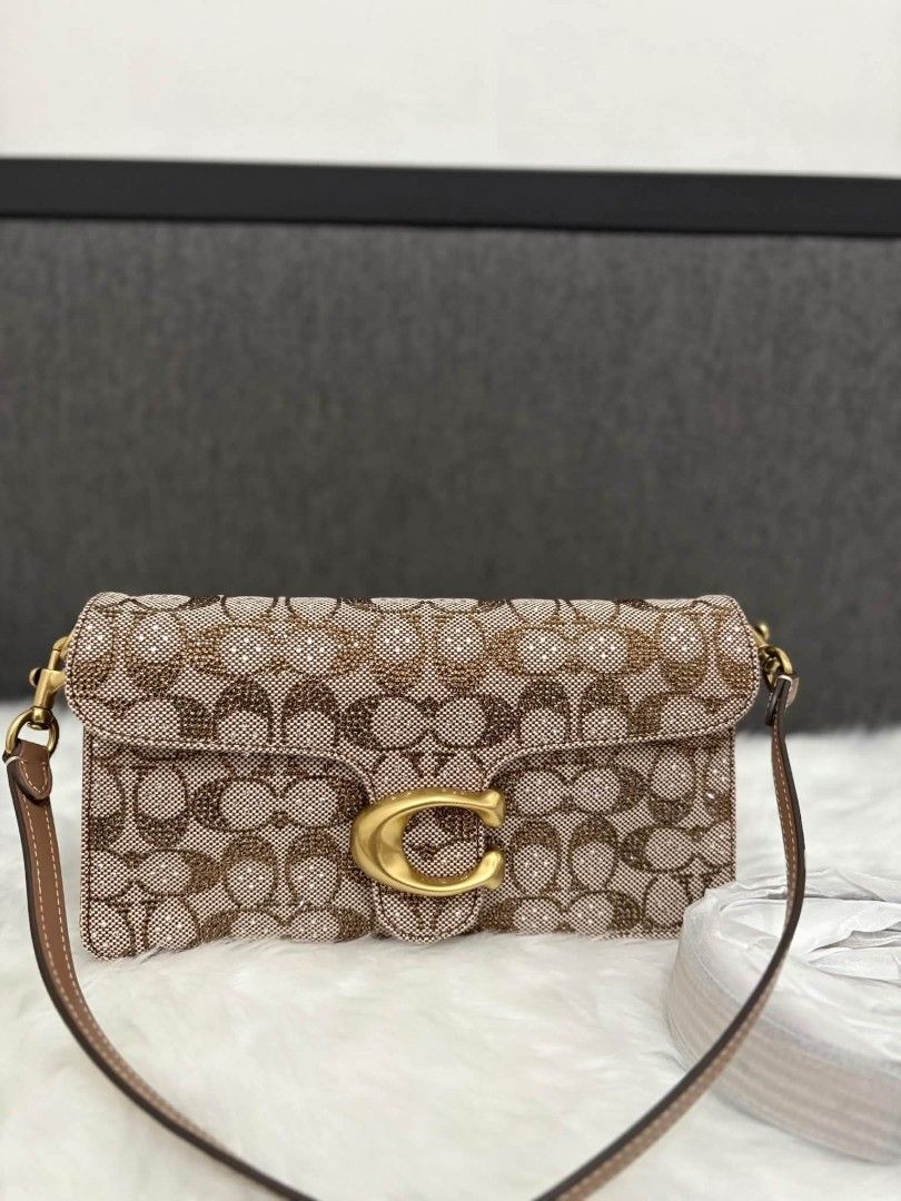 CoachbTabby 26 in Crystal Signature (Category: Shoulder Bags) located in Quezon City. Submitted by bagsboutiqueph (Listing ID 1463684655, Image 1). Description: LAST PRICE POSTED. LIMITED STOCKS! BRANDNEW WITH INCLUSIONS. COLOR MAY SLIGHTLY VARY IN ACTUAL DUE TO LIGHTING AND CAMERA SETTING. OTHER PHOTOS WILL BE SEND DURING PURCHASE AND FOR SURE BUYERS ONLY. WHEN IN DOUBT, DO NOT ORDER. THANK YOU..