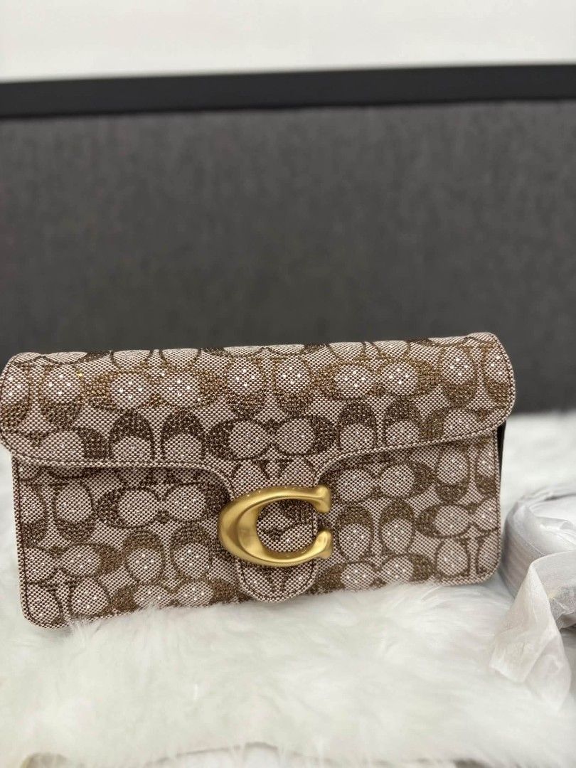 CoachbTabby 26 in Crystal Signature (Category: Shoulder Bags) located in Quezon City. Submitted by bagsboutiqueph (Listing ID 1463684655, Image 3). Description: LAST PRICE POSTED. LIMITED STOCKS! BRANDNEW WITH INCLUSIONS. COLOR MAY SLIGHTLY VARY IN ACTUAL DUE TO LIGHTING AND CAMERA SETTING. OTHER PHOTOS WILL BE SEND DURING PURCHASE AND FOR SURE BUYERS ONLY. WHEN IN DOUBT, DO NOT ORDER. THANK YOU..