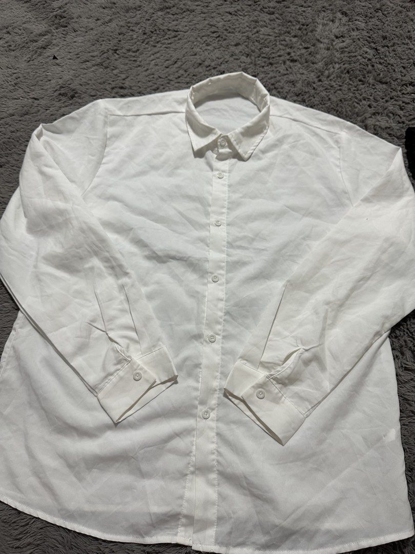 Collared White Blouse (Category: Blouses) located in Manila. Submitted by mae__________c (Listing ID 1463683559, Image 1). Description: no issue no stains unisex xl womens large to mens.
