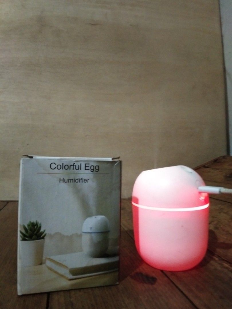 Colorful Egg Humidifier 220ML (Category: Air Purifiers & Dehumidifiers) located in Las Pinas. Submitted by jay.lo_120 (Listing ID 1463683908, Image 2). Description: ✅Good Condition ✅Strong Mist ✅RGB Light Working ✅With Original Box ❌No USB Cable, Just The Humidifier Quick sell, kailangan lang ng pera.