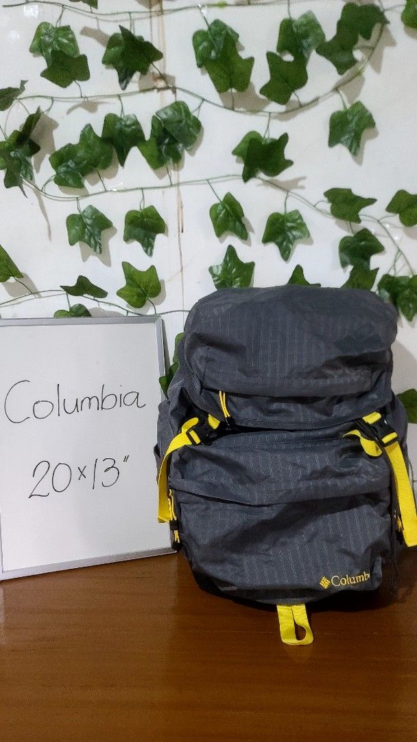 Columbia Grey Backpack with Yellow Accents (Category: Backpacks) located in Baguio. Submitted by phoeberose33384 (Listing ID 1463739668, Image 1). Description: - Grey Columbia backpack with vibrant yellow straps and accents. - Multiple pockets for excellent organization. - Subtle textured pattern on the material. - Adjustable straps for a comfortable, customized fit. - Ideal for day trips, school, or travel..