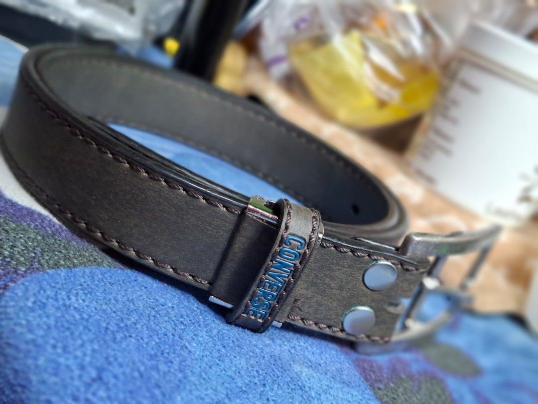 Converse Belt (Category: Belts) located in Lucena. Submitted by dai_suki (Listing ID 1463694022, Image 1). Description: - Dark grey Converse belt - Features iconic Converse logo on the keeper - Silver buckle - Multiple holes for adjustable sizing - Perfect for everyday wear - Selling because it's no longer used.