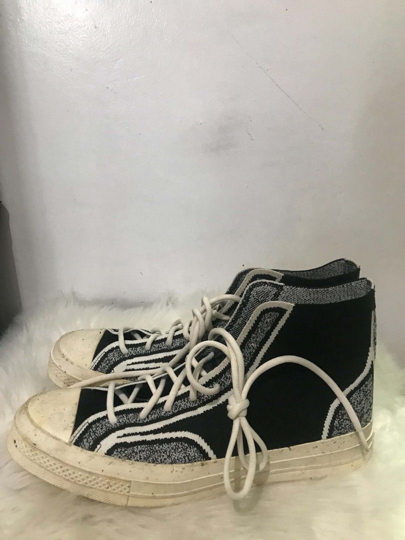Converse Chuck 70 Knit High Top Sneakers (Category: Sneakers) located in Manila. Submitted by vincent.seller (Listing ID 1463615783, Image 2). Description: - Black and grey knit high-top Converse Chuck 70s - Features white laces and a classic rubber toe cap - Soles have minor scuffs, consistent with normal wear - Perfect for stylish everyday use.