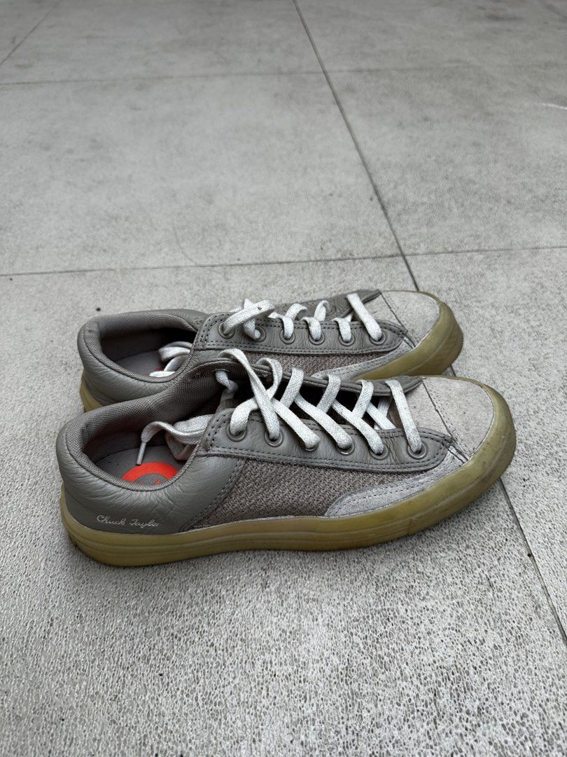 Converse Chuck Taylor All Star Grey Sneakers (Category: Sneakers) located in Quezon City. Submitted by jareddeuna (Listing ID 1463562179, Image 2). Description: - Grey Converse Chuck Taylor Sneakers - Unisex Size: 7.5 UK / 41 EUR / 26cm - Material: Leather and textile upper, rubber sole - Origin: Made in Vietnam - Condition: Shows some signs of wear on soles and toe caps - Laces: White - Ideal for: Casual wear.