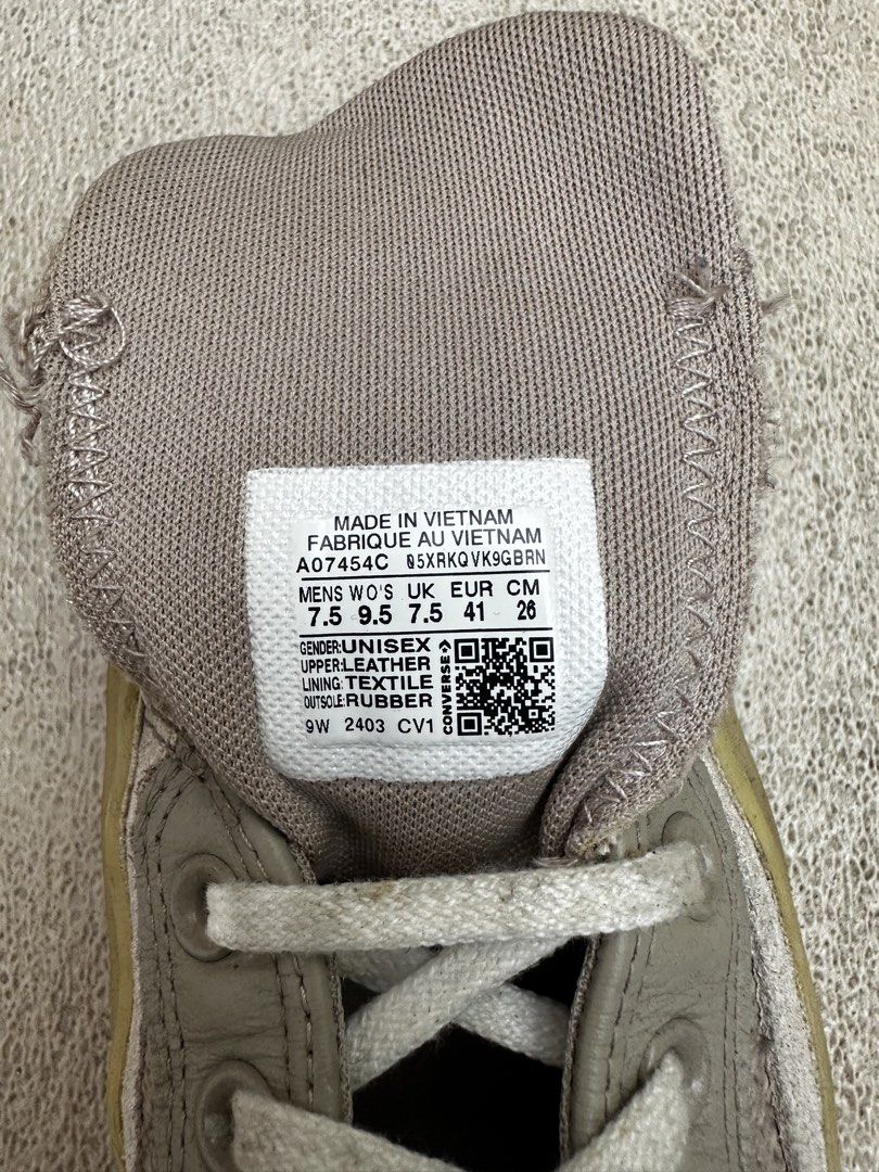 Converse Chuck Taylor All Star Grey Sneakers (Category: Sneakers) located in Quezon City. Submitted by jareddeuna (Listing ID 1463562179, Image 3). Description: - Grey Converse Chuck Taylor Sneakers - Unisex Size: 7.5 UK / 41 EUR / 26cm - Material: Leather and textile upper, rubber sole - Origin: Made in Vietnam - Condition: Shows some signs of wear on soles and toe caps - Laces: White - Ideal for: Casual wear.