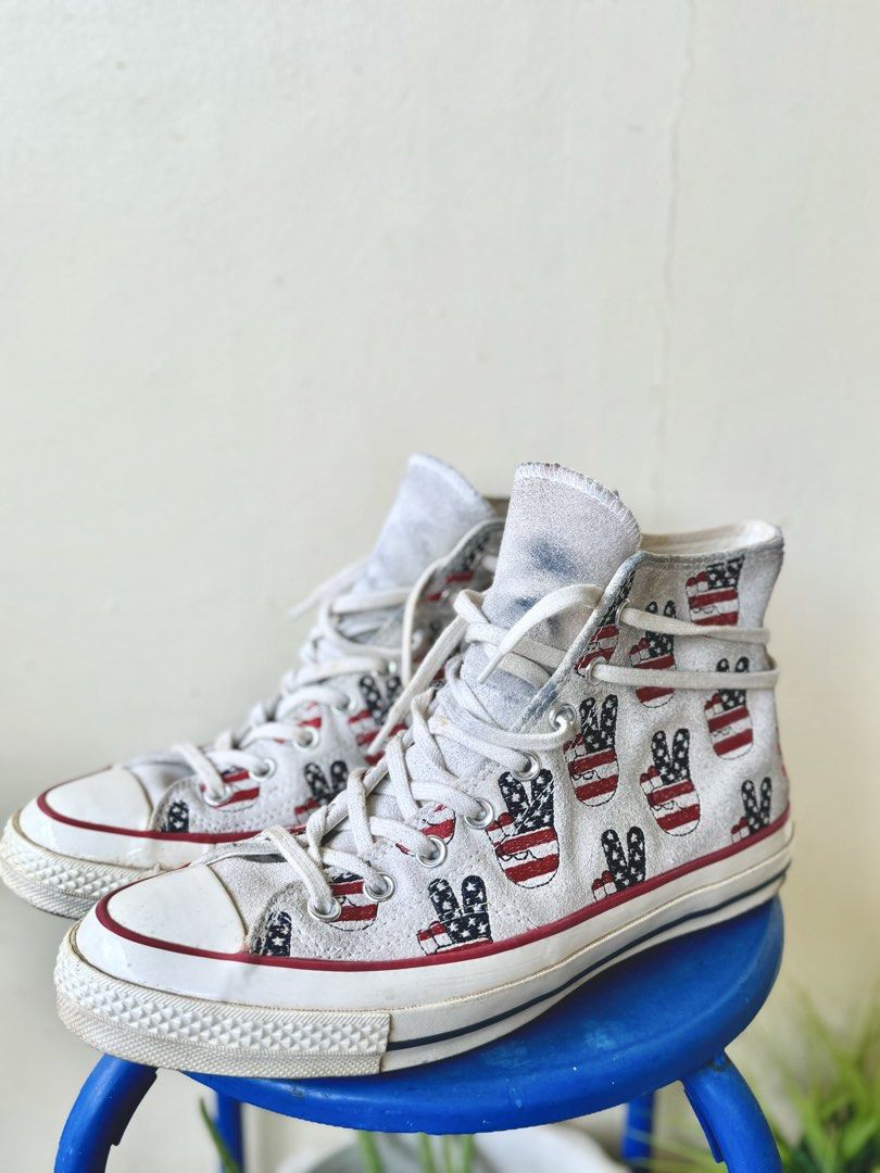 CONVERSE CTAS 70s ELECTION DAY (Category: Sneakers) located in Manila. Submitted by furugi24 (Listing ID 1463589679, Image 1). Description: CONV3RS3 CT@S 70s ELECTION DAY Size: 8.5 8/10 Slight sole sep SRP 1000 Classic Converse high tops - Fun American flag peace sign print - Beige canvas with red and blue accents - Lace-up closure - Perfect statement piece for casual outfits - Shows some signs of wear, but plenty of life left.