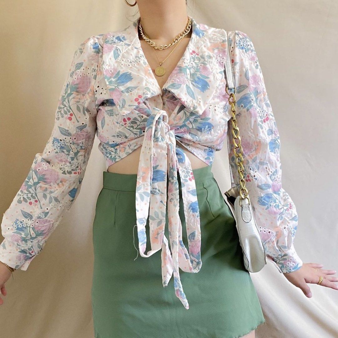 Cotton Eyelet Crop Self Top (Category: Sleeveless) located in Manila. Submitted by fromgg_ (Listing ID 1463622904, Image 1). Description: ❀ Cute floral print crop top ❀ Eyelet details ❀ Tie-front closure ❀ Collared neckline ❀ Long puff sleeves ❀ Perfect for high-waisted bottoms ❀ FREE SIZE / No brand / Ctto of the photo.