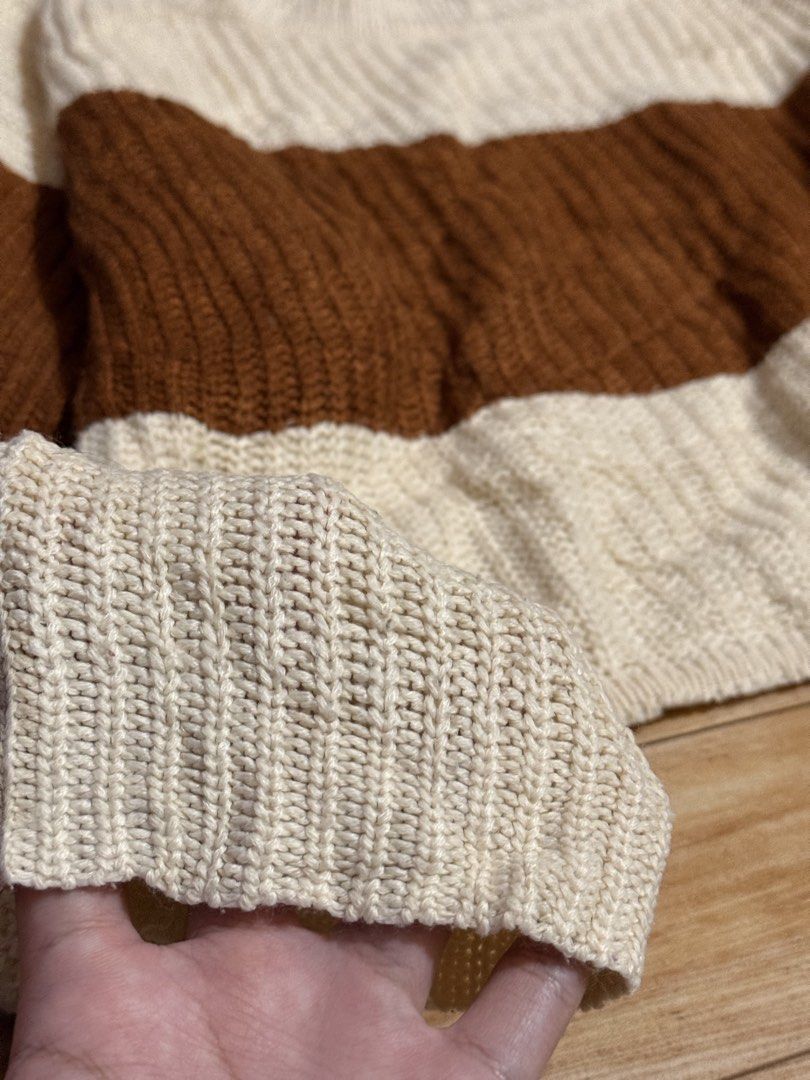 cozy striped cropped knit sweater (Category: Longsleeves) located in Binan City. Submitted by nakednini (Listing ID 1463705401, Image 2). Description: ⋆ fits medium to large ⋆ super cute cream and warm brown color ⋆ textured knit (soft and stretchable) ⋆ good preloved condition ⋆ perfect for layering or wearing on its own dm me if you'd like more details 💌.