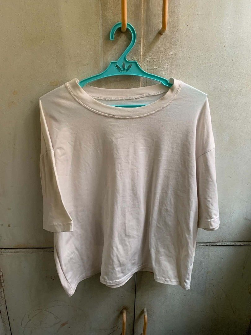 Cream Oversized T-shirt (Category: Shirts) located in Manila. Submitted by usagichan_rabbit (Listing ID 1463572856, Image 1). Description: free if naka 250 worth sa clothes.