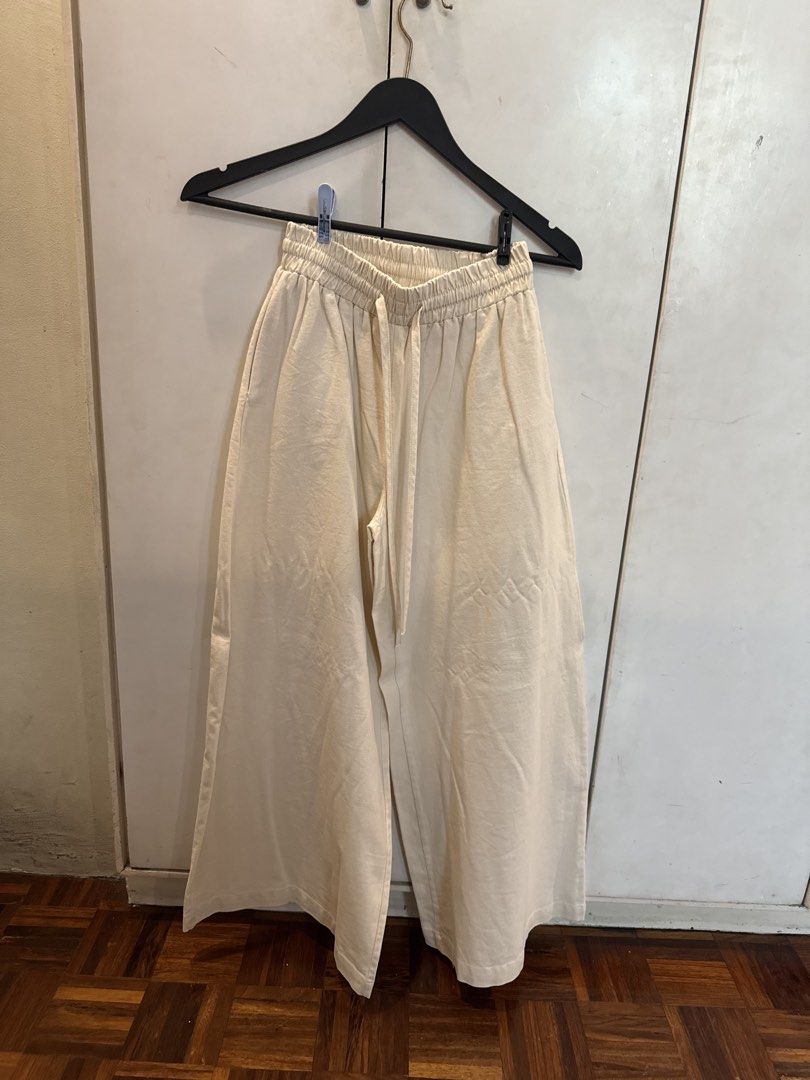 Cream Wide Leg Culottes with Drawstring Waist (Category: Jeans) located in Manila. Submitted by andromedanny (Listing ID 1463612371, Image 1). Description: - Cream colored culottes - Wide leg style for a relaxed fit - Comfortable elastic waistband with adjustable drawstring - Perfect for everyday casual wear - Effortlessly pairs with various tops.