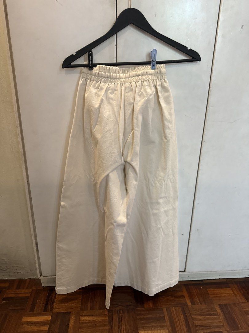 Cream Wide Leg Culottes with Drawstring Waist (Category: Jeans) located in Manila. Submitted by andromedanny (Listing ID 1463612371, Image 2). Description: - Cream colored culottes - Wide leg style for a relaxed fit - Comfortable elastic waistband with adjustable drawstring - Perfect for everyday casual wear - Effortlessly pairs with various tops.