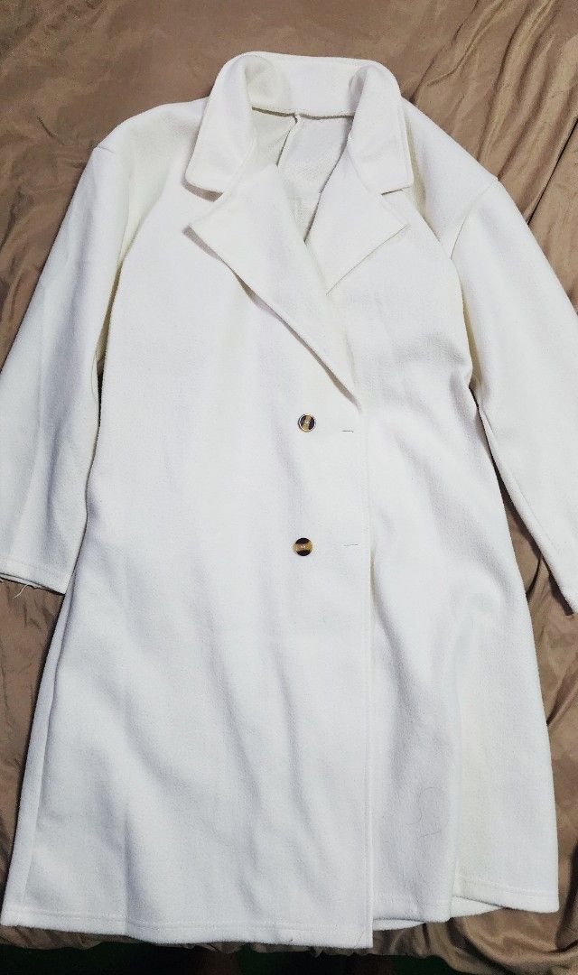 Cream woolen loose coat (Category: Coats, Jackets and Outerwear) located in Paranaque City. Submitted by cjpaz16 (Listing ID 1463649280, Image 1). Description: brought from tiktok shop. used 2x only. ideal for autumn 15-10°c weather.