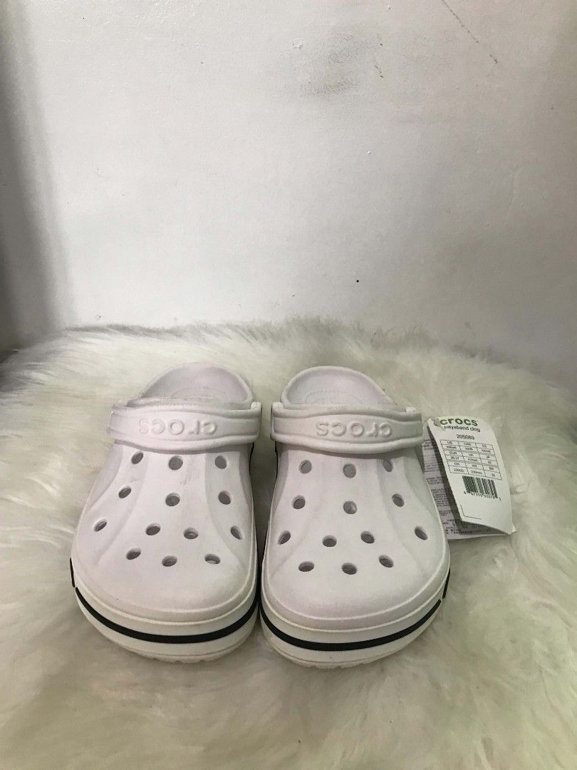 Crocs Bayaband Clog White (Category: Slippers & Slides) located in Manila. Submitted by vincent.seller (Listing ID 1463609893, Image 1). Description: - White Crocs Bayaband Clogs - Classic comfort and style - Easy slip-on and off design - Ideal for everyday wear - Brand new with original tags attached - Size: US Men 4-6 / Women 6-8.