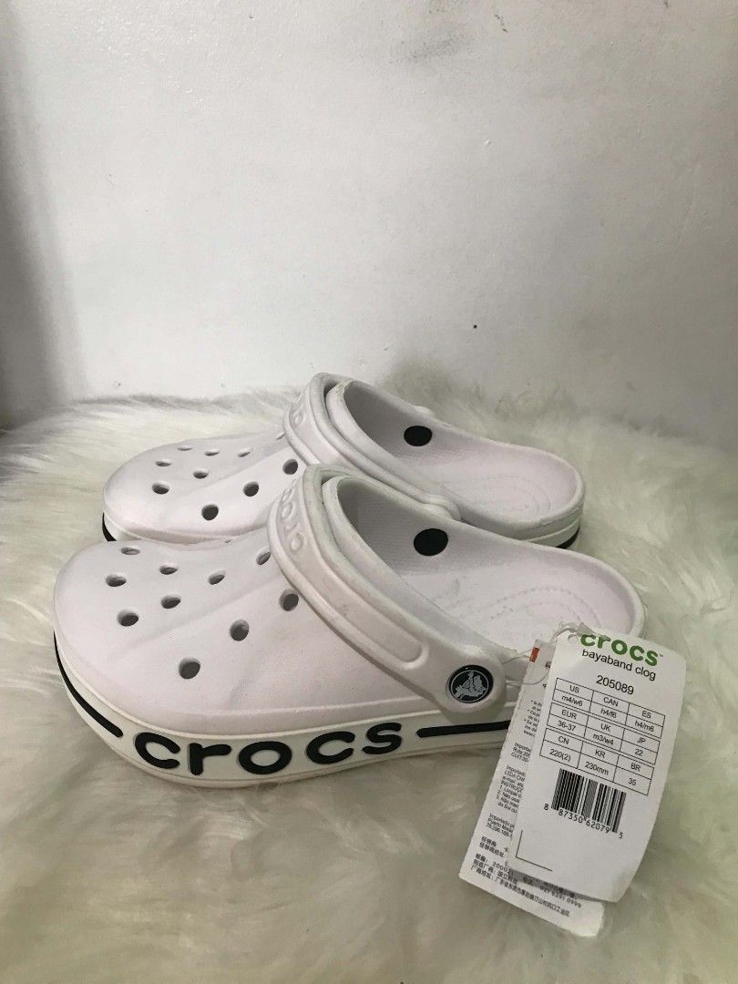 Crocs Bayaband Clog White (Category: Slippers & Slides) located in Manila. Submitted by vincent.seller (Listing ID 1463609893, Image 2). Description: - White Crocs Bayaband Clogs - Classic comfort and style - Easy slip-on and off design - Ideal for everyday wear - Brand new with original tags attached - Size: US Men 4-6 / Women 6-8.