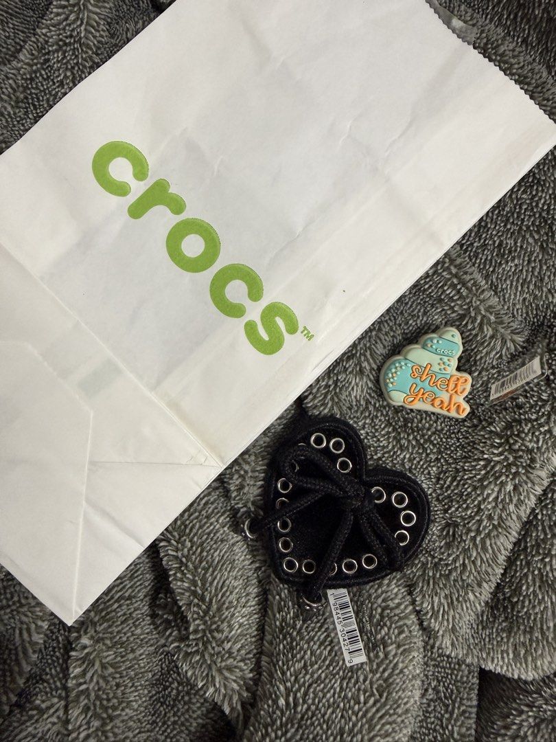 Crocs Jibbitz (Category: Other Accessories) located in Quezon City. Submitted by annela_ (Listing ID 1463695310, Image 1). Description: Shell 250 Black Heart 300.