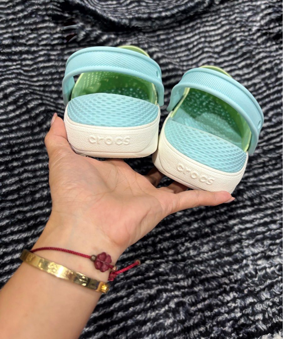 Crocs Literide Clogs Green/Aqua (Category: Slippers & Slides) located in Digos. Submitted by kathydiane76376 (Listing ID 1463693987, Image 2). Description: - Super comfy Crocs Literide Clogs - Color: Light green with aqua blue accents - Easy slip-on design - Ideal for everyday wear, beach trips, or lounging - Features soft and supportive Literide footbed.