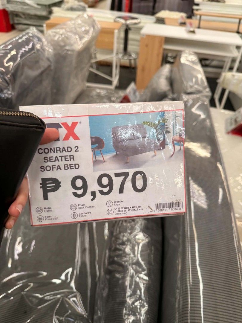 CTX Conrad 2 Seater Sofa Bed - Gray (Category: Sofas) located in Quezon City. Submitted by therese.e (Listing ID 1463615329, Image 1). Description: - CTX Conrad 2-seater sofa bed in gray - Easily converts from sofa to bed - Sofa dimensions: 117 x 86 x 81 cm - Bed dimensions: 198 x 117 x 29.5 cm - Features comfortable foam cushion - Sturdy metal frame with wooden legs - Upholstered in soft corduroy fabric - Original price: P9,970.