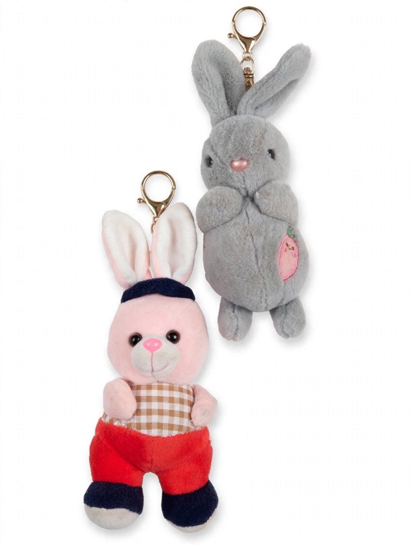 Cute Bunny Plush Keychains with Charms (Category: Plushies & Soft Toys) located in Manila. Submitted by noemiaspa1702 (Listing ID 1463741464, Image 1). Description: - Two cute plush bunny keychains - Pink bunny: checkered shirt, red pants - Grey bunny: strawberry detail - Both feature secure gold clasps - Ideal for decorating bags, backpacks, or as a fun accessory.