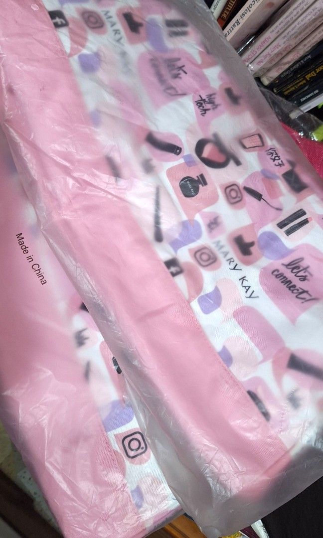 Cute Pink Travel Duffel bag (Category: Purses & Pouches) located in Quezon City. Submitted by tinylittlecorner (Listing ID 1463580228, Image 2). Description: - Adorable Mary Kay cosmetic bag - Features a fun pattern with social media icons, lipstick, and makeup brushes - Stylish pink handles and trim - Ideal for organizing makeup or toiletries - Convenient for travel or everyday use - Easy to carry 2pcs available.