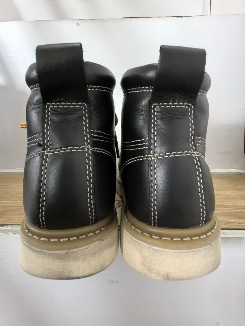 Dickies Black Leather Lace-Up Work Boots (Category: Boots) located in Makati City. Submitted by rubadubb (Listing ID 1462990360, Image 3). Description: - Brand: Dickies - Color: Black Leather - Style: Classic Moc-Toe - Features: Bright orange laces, white stitching - Sole: Durable - Condition: Good, with minor scuffs on sole and leather - Ideal for: Work or casual wear.
