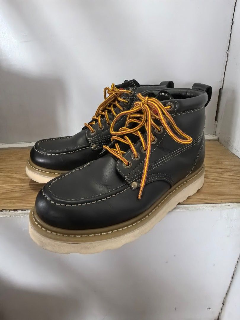 Dickies Black Leather Lace-Up Work Boots (Category: Boots) located in Makati City. Submitted by rubadubb (Listing ID 1462990360, Image 2). Description: - Brand: Dickies - Color: Black Leather - Style: Classic Moc-Toe - Features: Bright orange laces, white stitching - Sole: Durable - Condition: Good, with minor scuffs on sole and leather - Ideal for: Work or casual wear.