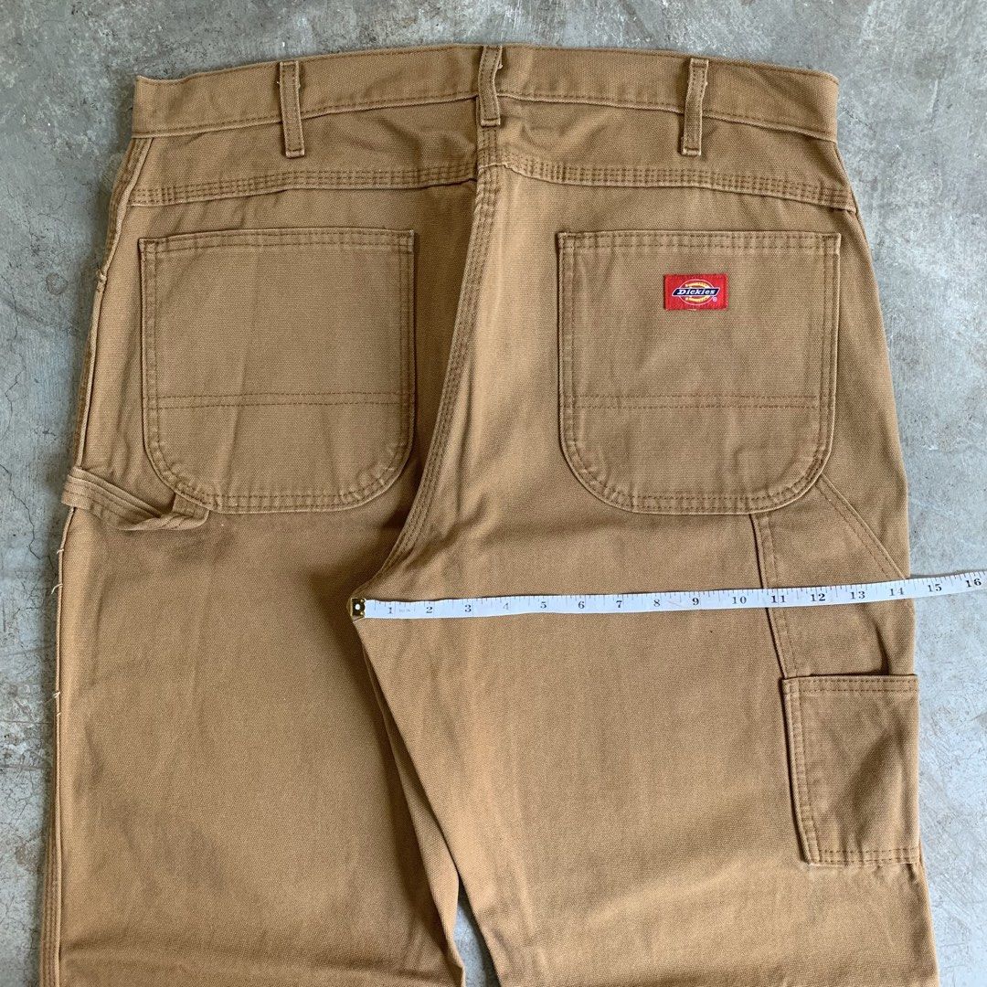 Dickies Carpenter Pants Tan Workwear (Category: Jeans) located in Manila. Submitted by emplysthrift. (Listing ID 1463684439, Image 2). Description: Actual dimes on tapemeasure Waist " 37Length "47 Excellent Condition Colorrate: 9.7/10 Flaws: Paint Unli vouch/vc for safe transactions 📲 Location: Laspinas City, Metro Manila, Brngy Talon Uno. 📍 DM IF INTERESTED📥 - Classic tan Dickies carpenter pants - Durable workwear style - Multiple pockets and