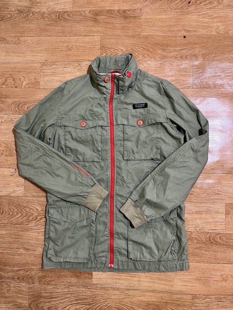 Diesel 55DSL Mod Coat Spring Coat Jacket Blouson (Category: Coats, Jackets and Outerwear) located in Zamboanga. Submitted by alterramz08 (Listing ID 1463714609, Image 3). Description: 55DSL (by Diesel) military-style field utility jacket featuring a bright red front zipper and orange contrast buttons. Size large on tag Width 23 length 31.5 Verygood Condition Price : 1,400 Pesos !!.