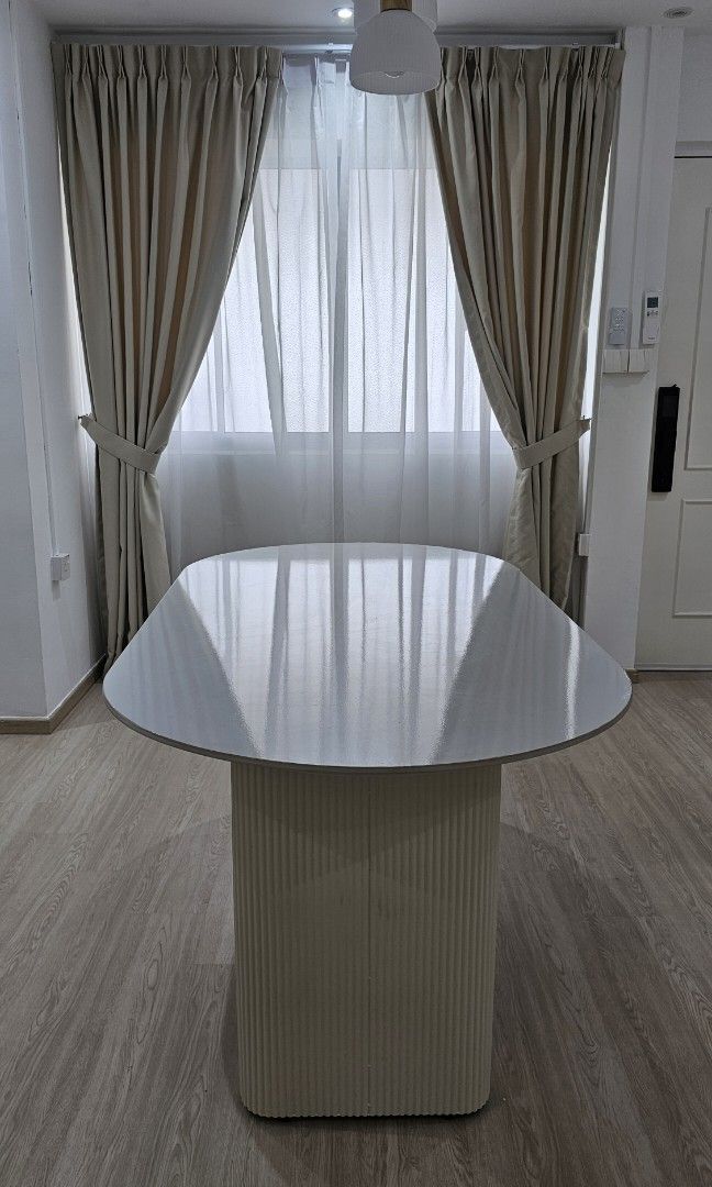 Dining Table (Category: Tables & Sets) located in Singapore. Submitted by icequeennn (Listing ID 1463630456, Image 3). Description: Dining Table for Sale 🤍 Dimensions: 180cm (L) × 75cm (H) Comes with a table protector, which we have used since day one to protect the table. We’ll include it together with the table — feel free to remove it if you prefer the table without it. Hardly used as we mostly use our island table. Serious buyers only. No lo