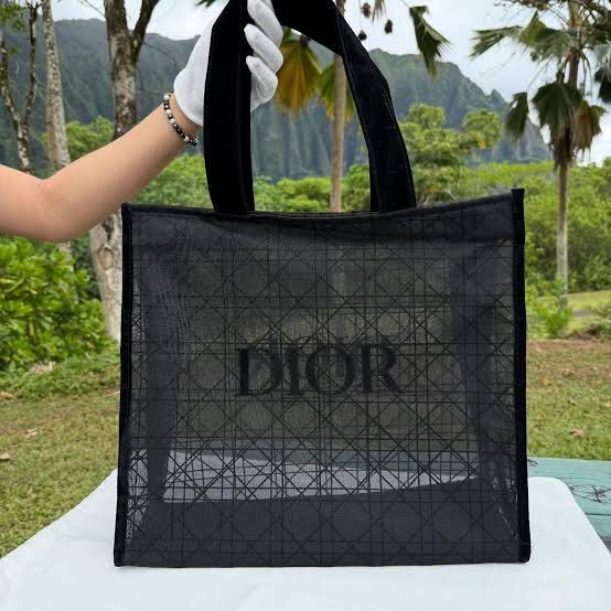 Dior Black Mesh Tote Bag (Category: Luxury Bags & Wallets) located in Cainta. Submitted by shopbyyna (Listing ID 1463637554, Image 1). Description: - Authentic GWP Gift with purchase Black Dior Tote Bag - Durable Mesh Material with Classic Dior Pattern - Luxurious Black Velvet Handles - Spacious Interior for Everyday Essentials - Prominent Dior Logo on the Front - Comes with Original Dust Bag - Ideal for Shopping and Daily Use.