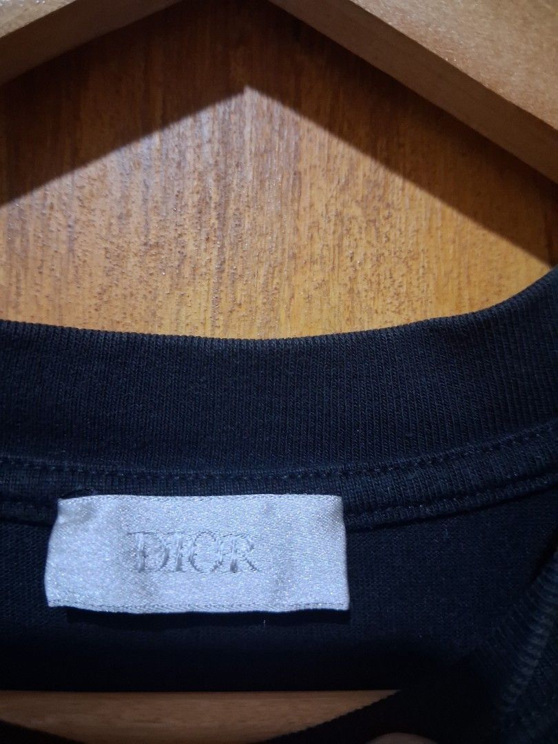 DIOR Colorblock T-Shirt (Category: Tshirts & Polo Shirts ) located in Tarlac. Submitted by dwaynebarr31837 (Listing ID 1463570630, Image 3). Description: - Authentic Dior T-shirt - Stylish black and grey colorblock design - Embroidered Dior logo on chest - Made in Italy - Size: S - Perfect addition to your Dior collection -20.5 width -27 lenght.