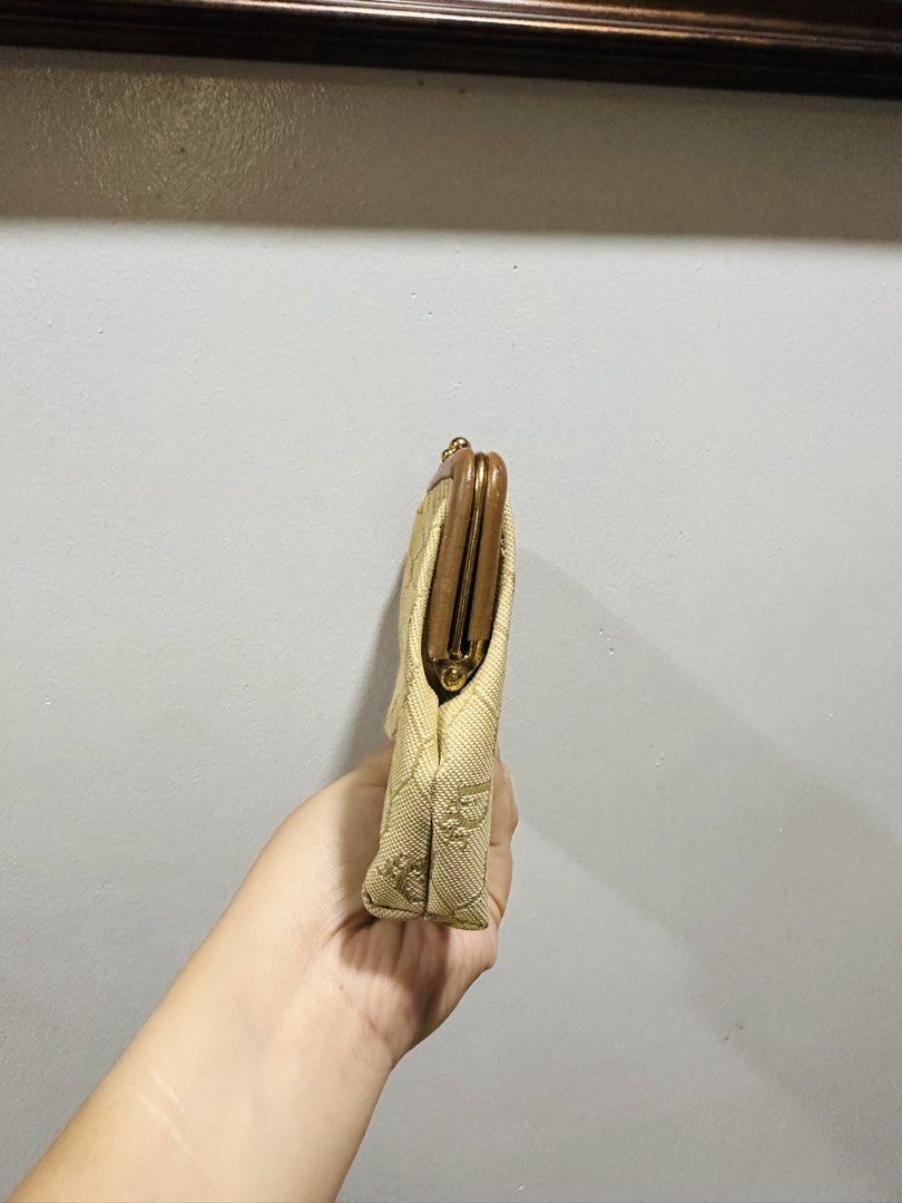 Dior Kisslock (Category: Purses & Pouches) located in Batangas. Submitted by stopandshopforluxury (Listing ID 1463736836, Image 2). Description: Guaranteed Original 💯 No flaws, can send more photos upon request. What you see is what you get. Shipping via Lalamove, J&T, and LBC Disclaimer: This is a preloved bag. Actual condition is shown in photos. Expect normal signs of wear. Colors may slightly vary due to lighting. Please check all photos and