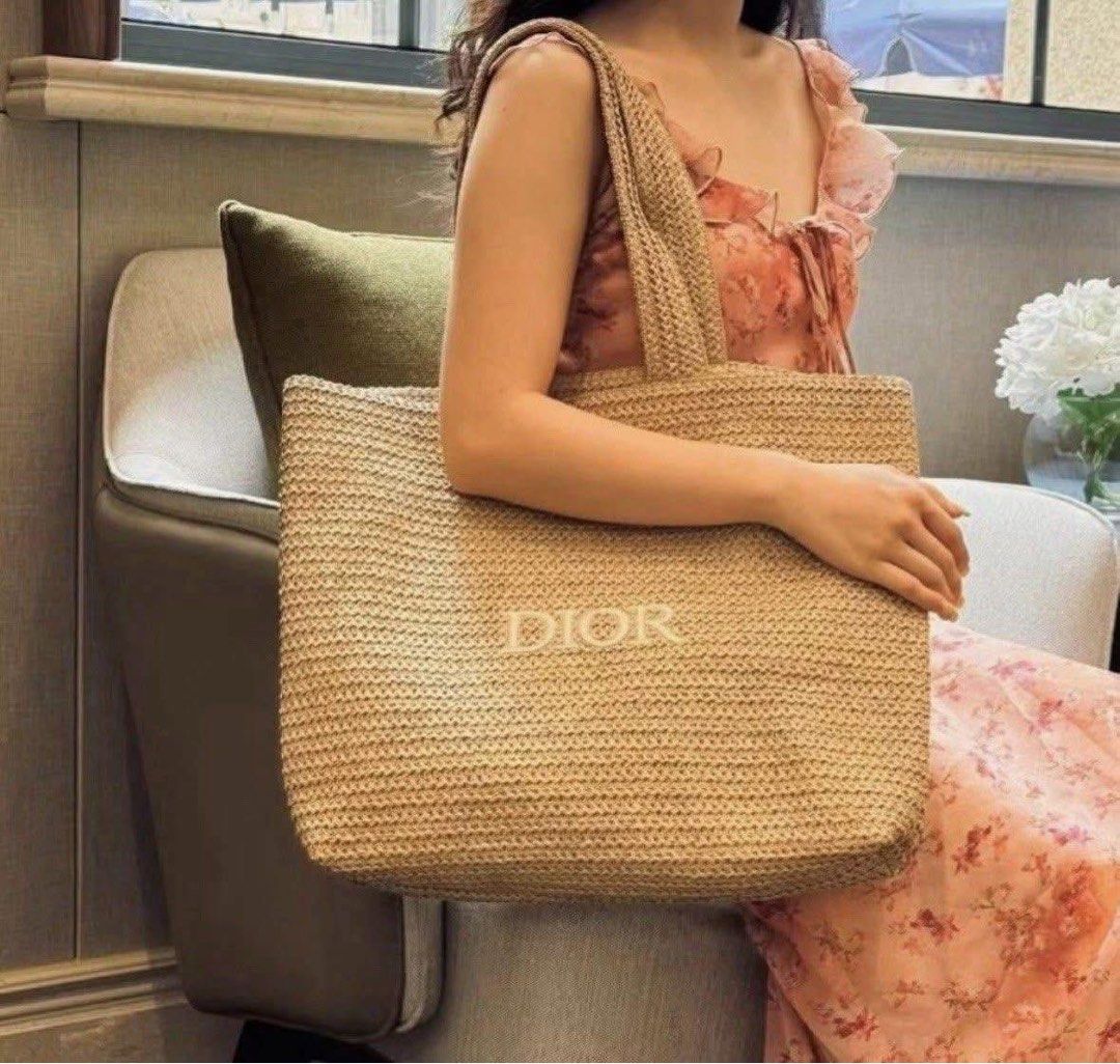 Dior Raffia Tote Bag (Category: Tote Bags) located in Mandaluyong City. Submitted by preloved.by.mommy.susie (Listing ID 1463688705, Image 2). Description: - Classic Dior tote bag - Made from woven raffia - Features iconic embroidered Dior logo - Spacious interior, ideal for everyday or travel - Comfortable shoulder straps - Stylish and versatile accessory.