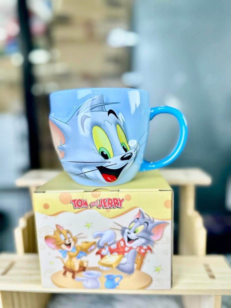 Disney Tall Mug with Box (Category: Coffee & Tea Tableware) located in Antipolo. Submitted by uniq.finds (Listing ID 1463741222, Image 3). Description: - Adorable Winnie the Pooh, Mickey & Minnie Mouse, Tom & Jerry, Lotso characters - Includes original box - Perfect for morning coffee or tea - A must-have for any Disney fan.