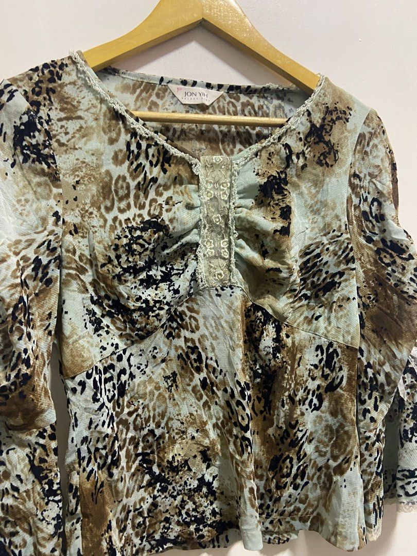 distinct Y2K aesthetic with mixed animal/leopard print (Category: Longsleeves) located in Cagayan de Oro. Submitted by timeless_trends (Listing ID 1463713191, Image 3). Description: dm for more details .