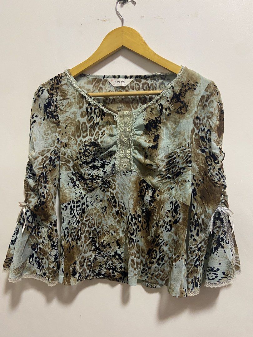 distinct Y2K aesthetic with mixed animal/leopard print (Category: Longsleeves) located in Cagayan de Oro. Submitted by timeless_trends (Listing ID 1463713191, Image 2). Description: dm for more details .