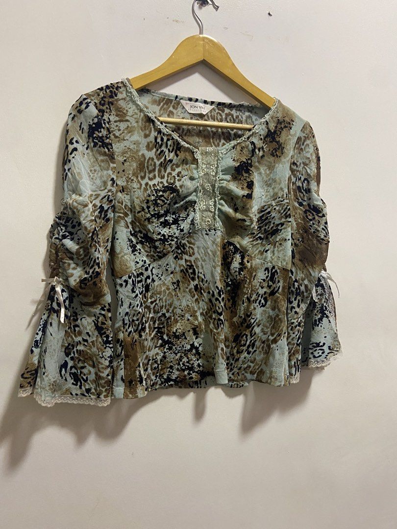 distinct Y2K aesthetic with mixed animal/leopard print (Category: Longsleeves) located in Cagayan de Oro. Submitted by timeless_trends (Listing ID 1463713191, Image 1). Description: dm for more details .