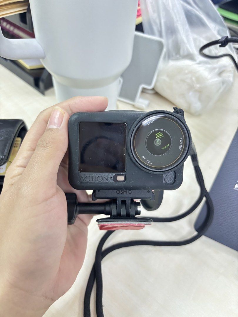 DJI Osmo Action 6 Camera with Mount (Category: Video Cameras) located in Manila. Submitted by hasminandr31768 (Listing ID 1463576118, Image 2). Description: - DJI Osmo Action 6 camera - Compact design, perfect for capturing adventures - Includes a mount for easy attachment - Clear and functional screen - Ready for your next trip or project - Feel free to ask questions! - 1 month palang sakin - RF DI KO NAGAGAMIT.
