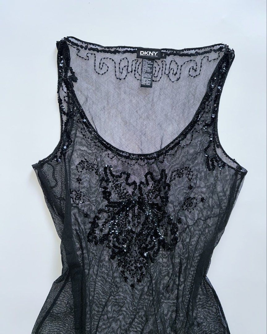 dkny black sheer mesh sequined top (Category: Sleeveless) located in Lipa City. Submitted by mayumi.vtg (Listing ID 1463706524, Image 2). Description: ❀ fits s-m | bust: 32-34in ❀ stretchy fabric, complete sequins, see-through, w/ side slits.