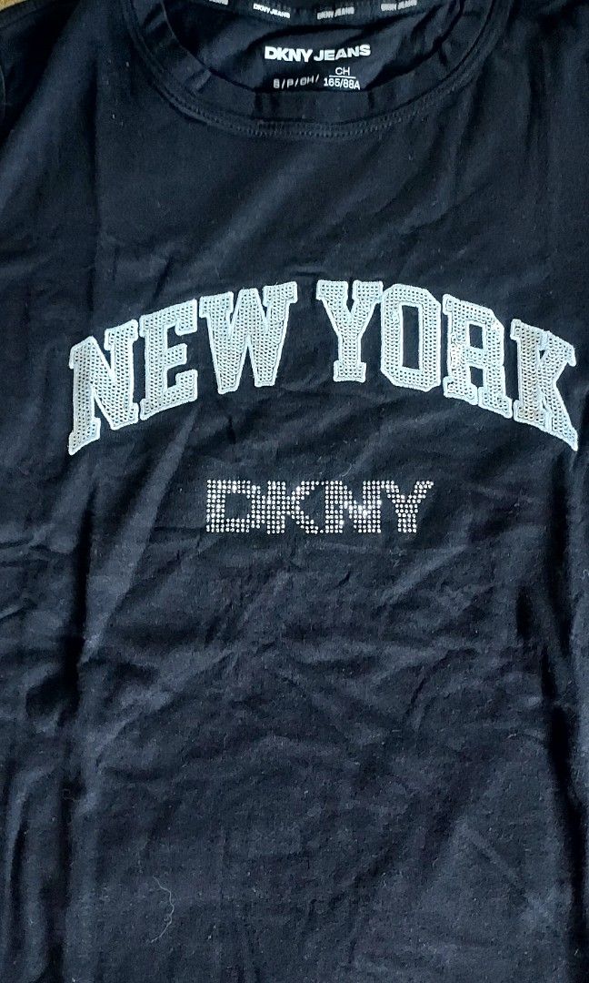 Dkny tshirt womens (Category: Shirts) located in Taguig. Submitted by chariliehi02514 (Listing ID 1463609516, Image 2). Description: brandnew with tag guaranteee original from US size small, can fit semi medium frame runs big onhand and ready to ship MOP - gcash MOD - lalamove, grab or j&t @ buyers expense.