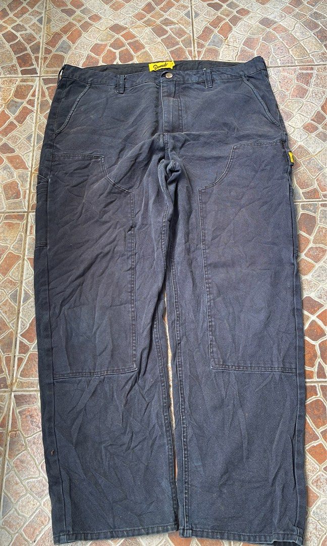 Donut Work double knee Pants (Category: Jeans) located in Balanga. Submitted by death_vintage (Listing ID 1463657579, Image 2). Description: - Dark wash work pants from Donut - Tagged size 10 - Multiple pockets for utility - Embroidered Donut logo on back right pocket - Button and zip closure - Minor distressing on the back pocket area.