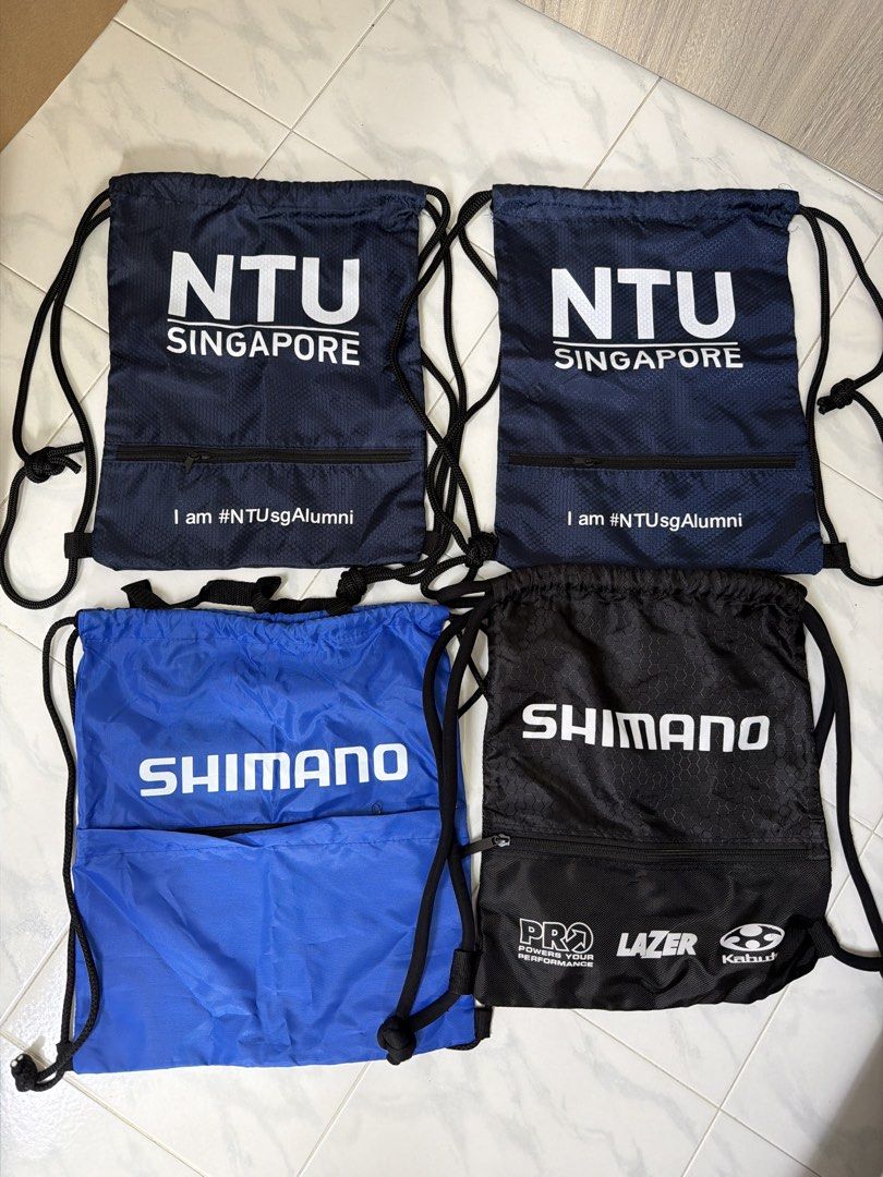 Drawstring bag (Category: Backpacks) located in Singapore. Submitted by xkonedc (Listing ID 1463621249, Image 1). Description: Shimano Drawstring bag NTU Draw string bag Everything for $7 Bagpack Small bag Casual bag Backpack Drawstring.