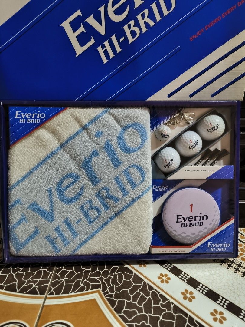 Dunlop everio hi-brid (Category: Golf) located in Cavite. Submitted by jenniferst88424 (Listing ID 1463682362, Image 2). Description: Set Contents Golf Balls: White Dunlop Everio Hi-Brid balls (number 1 large-diameter ball plus sleeve balls) Towel: White cotton hand/face towel with blue "Everio Hi-Brid" embroidery Accessories: Golf tees and a ball marker / keychain set.