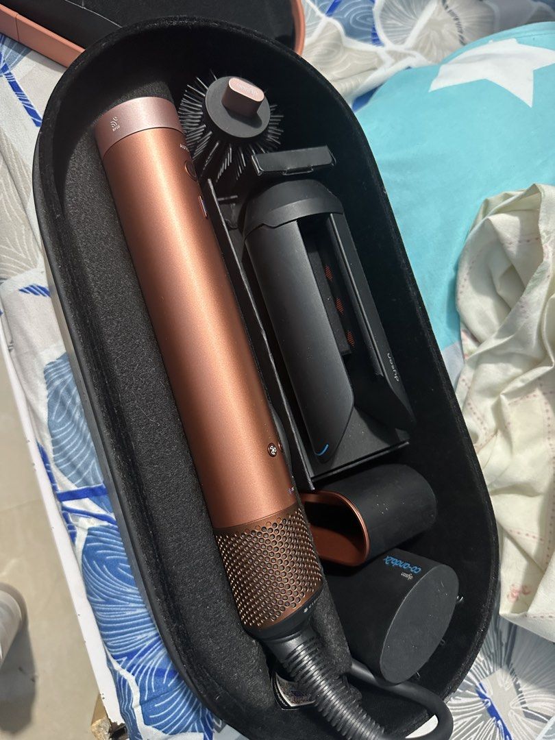 Dyson Airwrap Complete Styler Rose Gold (Category: Hair) located in Cavite. Submitted by graceapa92075 (Listing ID 1463663162, Image 3). Description: - Dyson Airwrap Complete Styler in Rose Gold - Includes all original attachments (as pictured) - Comes with protective case RFS: need funds and these are barely used.