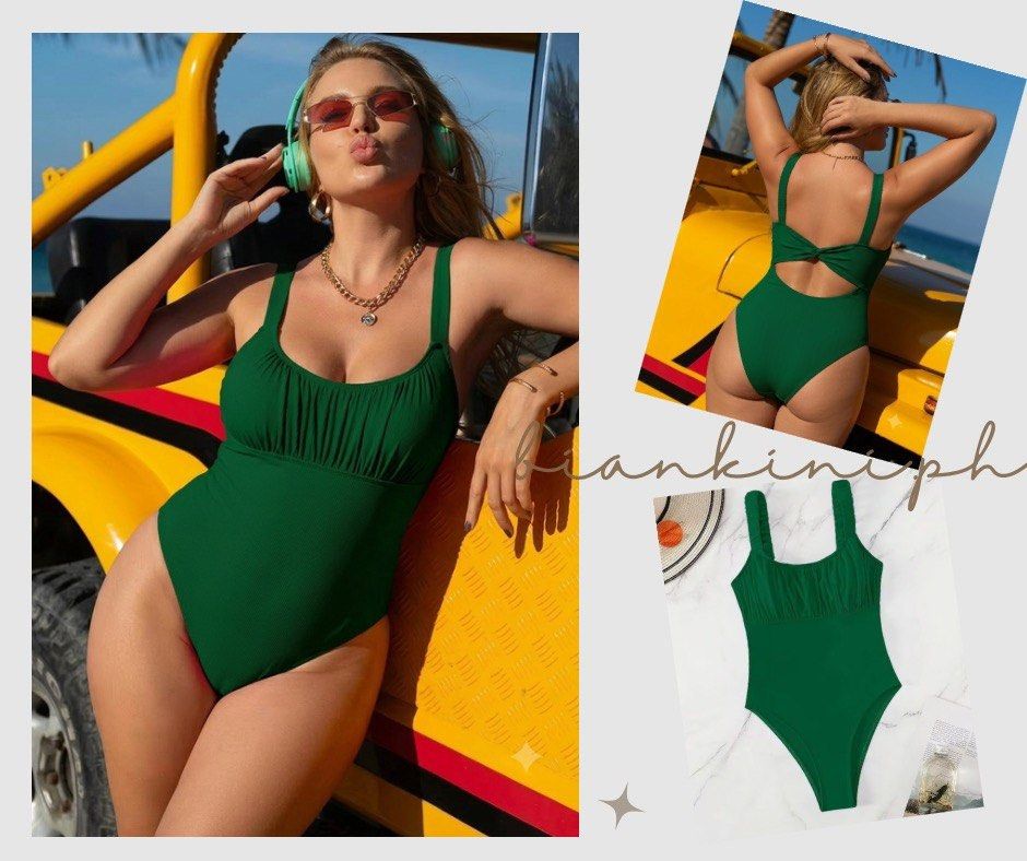 Emerald Green Ruched One-Piece Swimsuit with Back Tie (Category: Bikinis & Swimsuits) located in Las Pinas. Submitted by kathybianca (Listing ID 1463589847, Image 1). Description: - Chic emerald green one-piece swimsuit - Flattering ruching detail on the bust - Adjustable tie-back for a perfect fit - Comfortable wide straps - Stylish ribbed texture - Ideal for beach days and pool parties.