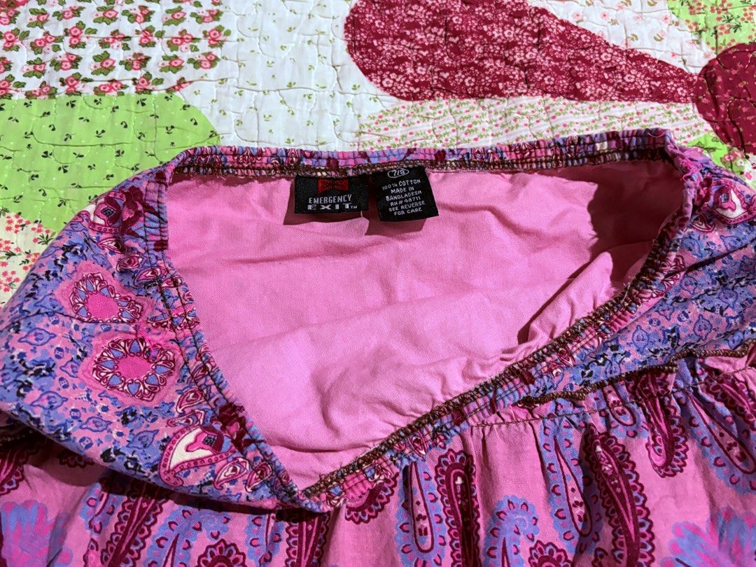 Emergency Exit Pink Paisley Tiered Mini Skirt (Category: Skirts) located in San Mateo. Submitted by _kristineee_ (Listing ID 1463716425, Image 3). Description: - Cute pink tiered mini skirt - Features a fun paisley print - Ruffled hem with delicate lace trim - Comfortable elastic waistband - Versatile for casual outings or dressing up - Flirty and fun design.