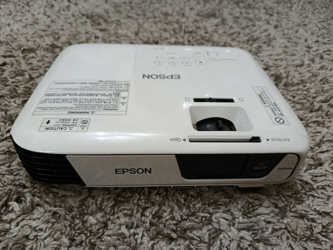 EPSON EB-S31 PROJECTOR COMPLETE SET + FREE WIDE SCREEN | FULLY WORKING | Seldom Used (Category: Projectors) located in Makati City. Submitted by yuji0411 (Listing ID 1463683284, Image 2). Description: SELLING Epson EB-S31 Projector + FREE Wide Screen — Complete Set Perfect for: 🎬 Movie / home theater setup 🎮 Gaming 📚 School presentations / reports 💻 Work presentations 🎞️ Family movie nights / events Condition: Used but well-kept. May normal 