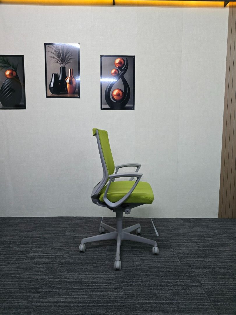 Ergonomic Mesh Office Chair - Green (Category: Office Furniture & Fixtures) located in Quezon City. Submitted by kevinmacabata12997160 (Listing ID 1463643069, Image 2). Description: - Ergonomic green office chair - Breathable mesh back for comfort - Adjustable height for personalized fit - Smooth-rolling wheels for easy movement - Ideal for long hours of sitting.