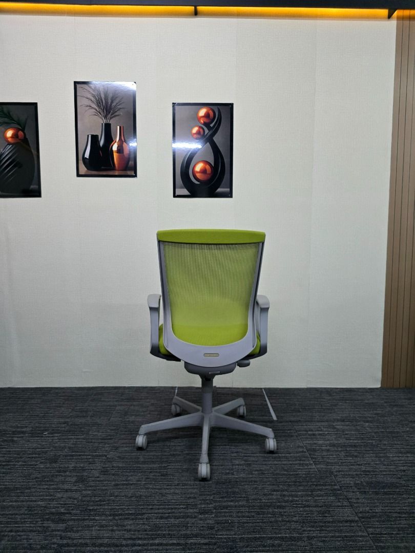 Ergonomic Mesh Office Chair - Green (Category: Office Furniture & Fixtures) located in Quezon City. Submitted by kevinmacabata12997160 (Listing ID 1463643069, Image 3). Description: - Ergonomic green office chair - Breathable mesh back for comfort - Adjustable height for personalized fit - Smooth-rolling wheels for easy movement - Ideal for long hours of sitting.